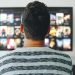 Student watching movies about university lifestyle